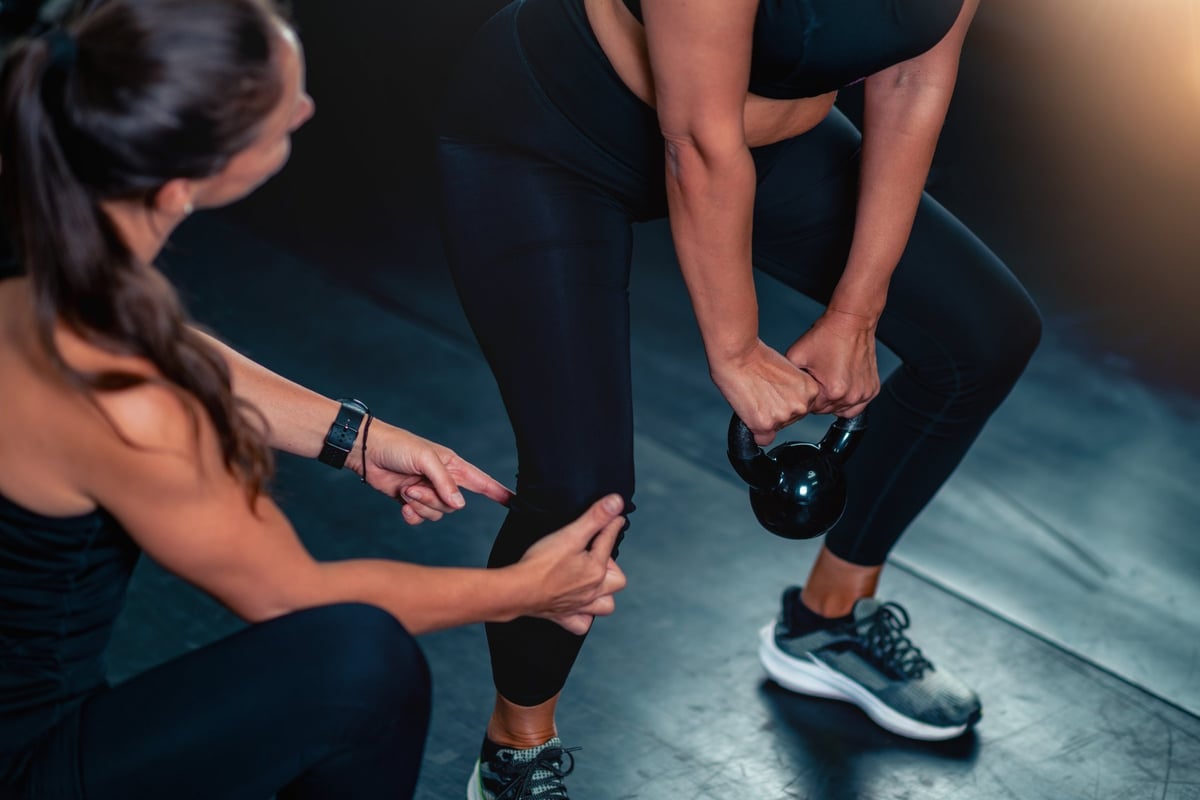 Kettlebell strength training with close coaching guidance